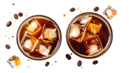 Overhead shot of two iced coffee drinks with ice cubes and scattered coffee beans