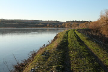 A road next to a body of water