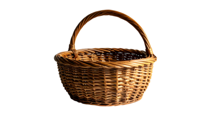 A close-up shot of an empty, woven basket with a curved handle. The warm lighting emphasizes the natural texture and shadow