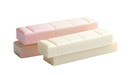 Close-up studio shot of rectangular, light-colored, segmented bars in varying shades, arranged in a visually pleasing stack