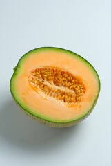 Isolated a half of Cantaloupe, Muskmelon, Cucumis melo, Honeydew or Melon Madu. Organic fruit, healthy food