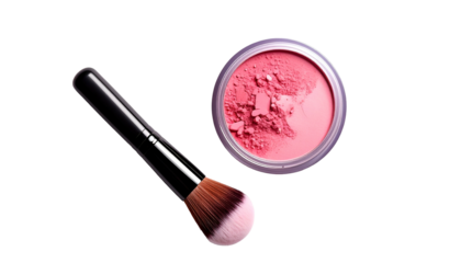 Powder blush and brush lie against a stark black background, showcasing makeup