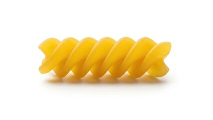 Single piece of uncooked, yellow, spiral pasta on a white background