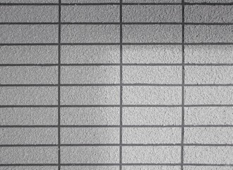 Concrete wall texture background with rough light grey brick pattern for architectural and industrial design © ILovePhoto_TH