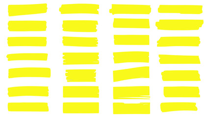 Abstract arrangement of yellow brushstroke like shapes on a black background