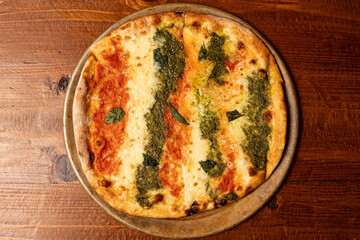 Mozzarella, pesto and Alfredo pizza