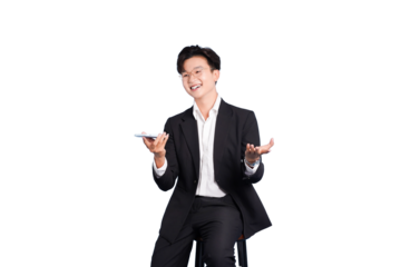 Confident Professional Presentation: A poised young professional in a sharp suit sits, holding a tablet while presenting a concept, with a welcoming.