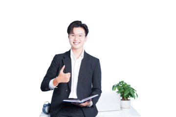Successful Businessman's Approval: A confident businessman, poised and successful, offers an enthusiastic thumbs-up, symbolizing approval and achievement in a modern work environment.