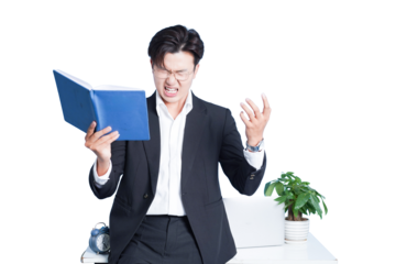 Frustrated Businessman: A stern-faced man in professional attire expresses frustration while reading a book, capturing a moment of stress.