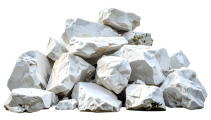 Pile of rough-hewn, white stone blocks with various sizes and jagged edges