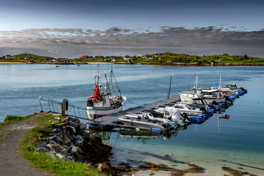 Harbor Of Island Sommaroy With Fisher Boats and Remote Village In Norway