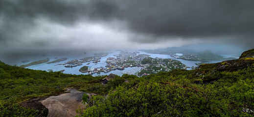 View From Hiking Path Devils Stairs To Djevelporten Over City Svolvaer On Lofoten Islands In Norway