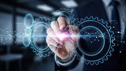 Sophisticated, digitally enhanced image of a business professional’s hand interacting with glowing, interconnected neon blue gears and a vibrant pink energy core, set against a blurred modern office