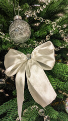 Festive Scandinavian Christmas Tree with White Silver Ornaments.