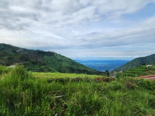 mountain landscape with blue sky and clouds