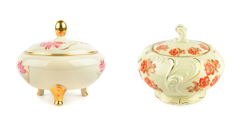 Elegant ceramic candy bowls with gold trim and floral patterns.