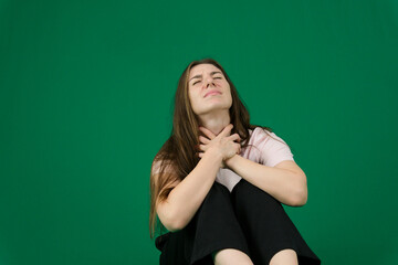 Pregnant, heartburn and woman with nausea in home for hormonal symptoms, discomfort and maternity health. Pregnancy, person and sore throat on sofa with acid reflux, prenatal bloating and healthcare.