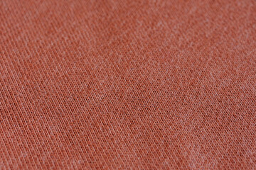 Brown terracotta knitted jersey fabric texture, sportswear knit macro background