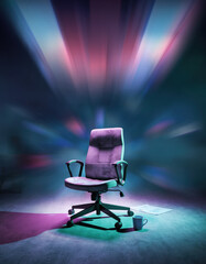 Empty office chair in dark room under fading neon light, concept of loneliness, fatigue and stress. symbol of work burnout, pressure, and corporate absence