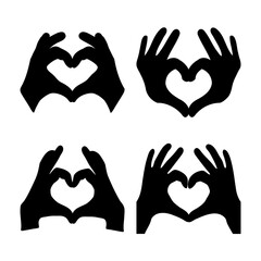 Obraz premium Four black silhouettes of hands forming heart shapes, symbolizing love and affection