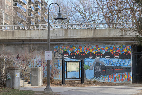 Dominion Coal and Wood mural at Mount Pleasant where the Kay Gardner Beltline Trail exits / enters cemetery, Toronto