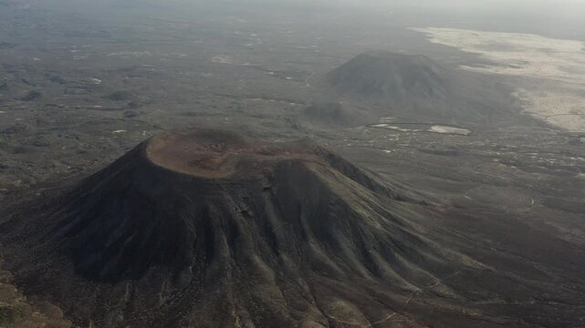 Aerial view over La Mancha crater in the volcanic Area of the Bayuyo, on the Island of Fuerteventura, Spain