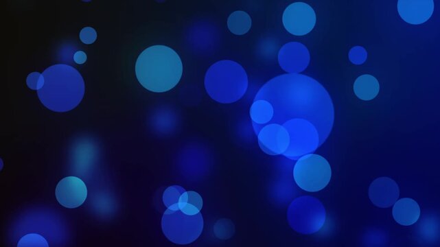 Abstract blue bokeh light background with soft glowing circular shapes