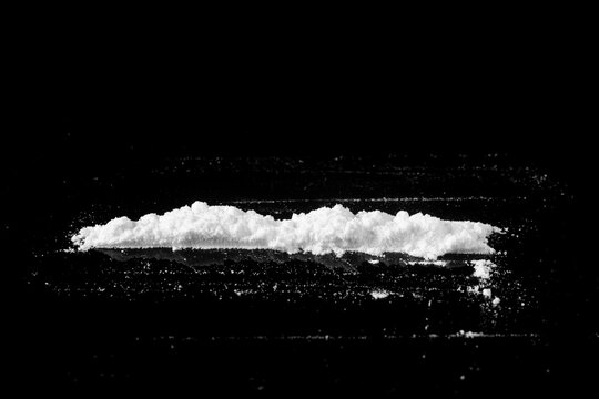 white powder on a black background close-up