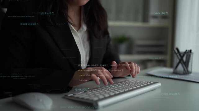 A professional woman focused on typing in a modern office setting. The image features an abstract code overlay, emphasizing the intersection of technology and business in the digital age. Xenic