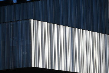 Modern office building with an interesting perforated metal facade