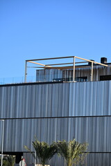 Obraz premium Modern office building with an interesting perforated metal facade