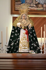 Statue of the Virgin Mary in a blue robe
