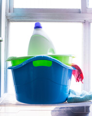 laundry and home cleaning kit with plastic buckets and chemicals
