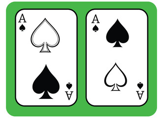 Two Ace of Spades playing cards on green background