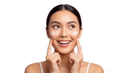 Woman applying cream to her face with a smile on her face isolated on transparent background