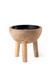 Minimalist wooden candle holder on three legs, isolated on white background, rustic handcrafted home decor object.