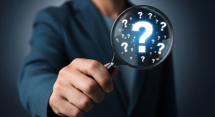 Business Professional Holding Magnifying Glass With Question Marks Showing Investigation Strategy Analysis And Decision Making Process
