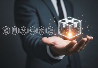 A person holding a glowing box with logistics icons floating above their hand in a dark setting