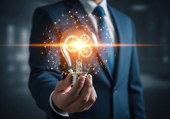 Businessman holding glowing light bulb with gears and network connections in his hand idea concept
