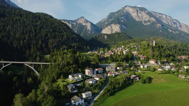 Aerial view around the village Tamins in Switzerland on a sunny day in summer