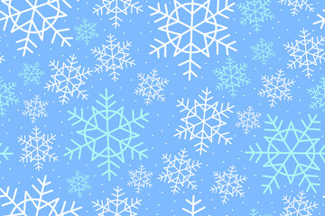 Seamless winter pattern with white and light blue snowflakes on soft blue background. Festive snowflake design perfect for Christmas backgrounds, winter holidays, wrapping paper, textiles, wallpapers