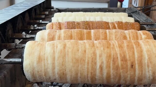 Making a traditional Hungarian Chimney Cake kurtosh kalach