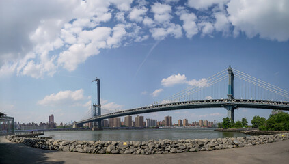 View of the Manhattan Bridge connecting boroughs with classic NYC urban atmosphere