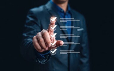 A businessman interacts with a futuristic digital interface in a dark environment