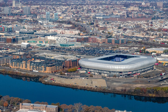 Aerial view of Harrison and Newark New Jersey with residential buildings, warehouses and the stadium