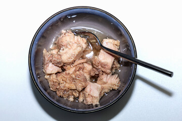 Canned tuna served in bowl.