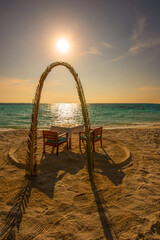 Tropical island beach landscape exotic shore coast. Tranquil closeup calm sea water waves with palm trees. Beautiful sunset. Summer vacation, holiday amazing nature. Relax paradise, Maldives.