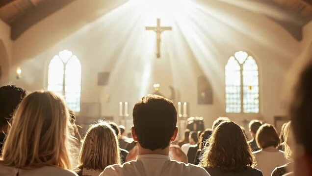 People Raising Hands in a Church Celebrating and Worshiping with the Sun Rays
