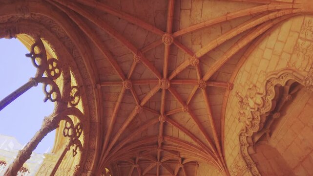 Lisbon, Portugal - July 6 2025: The cross arche structure in the cloister of Jer&oacute;nimos Monastery in Lisbon Portugal