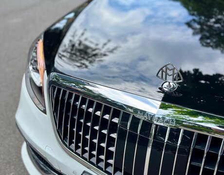 Close-up of the front of a black Maybach limousine